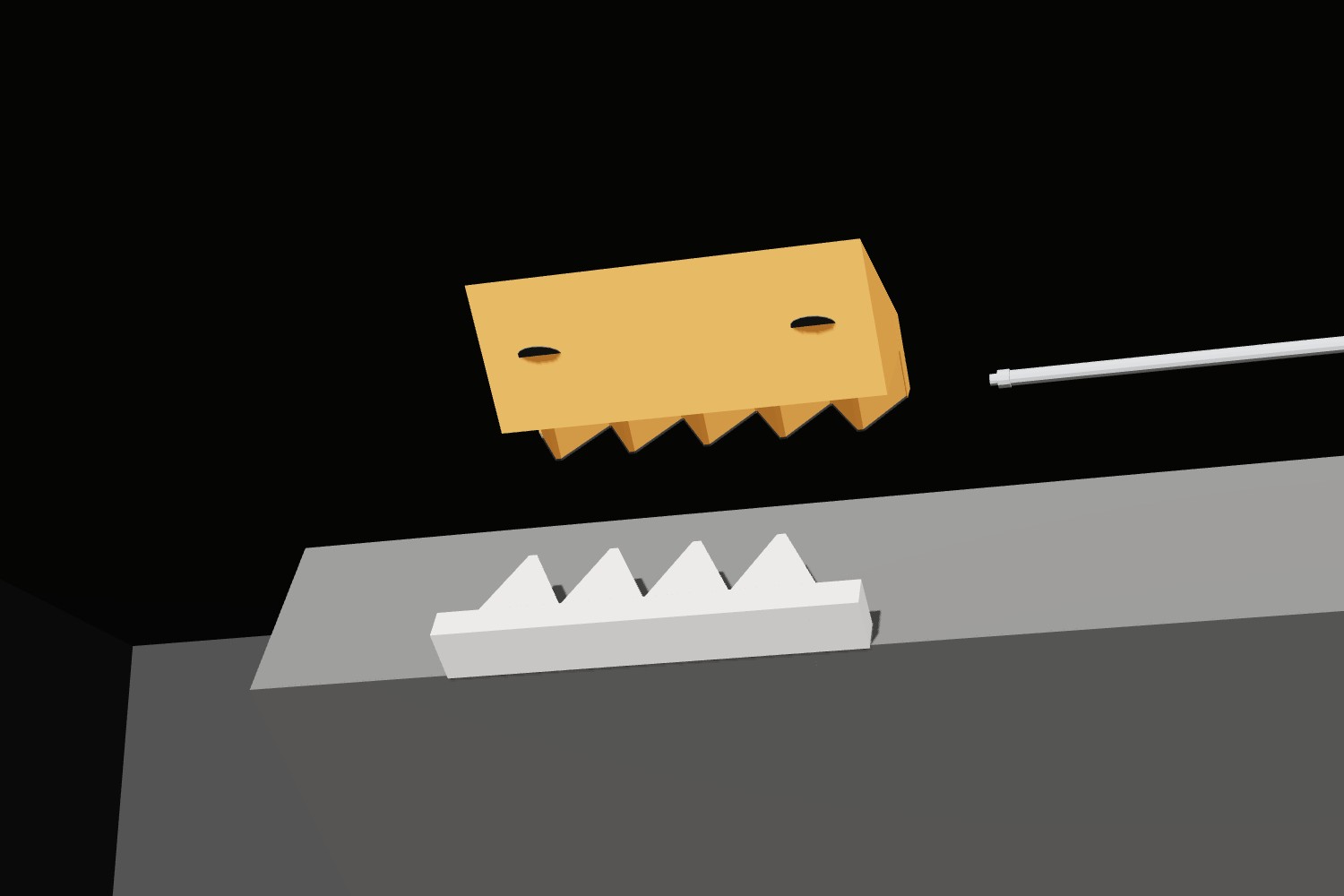 An edge panel resting open on its hinge, the shark-tooth pieces on the ceiling and the wall